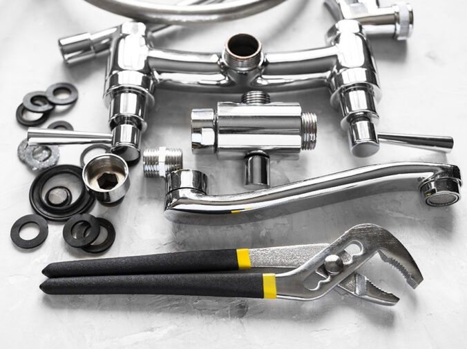 polished chrome sink faucet parts and plumbign wrench